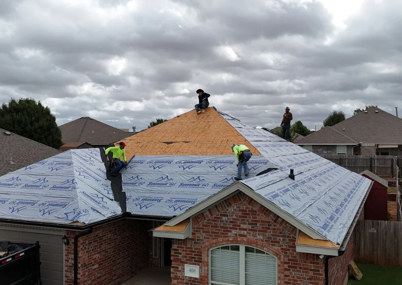 roofers working on new roof