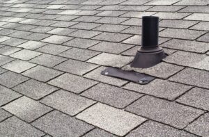 rooftop shingles and vent pipe