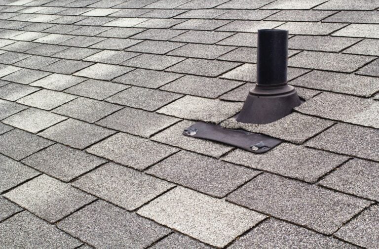 rooftop shingles and vent pipe